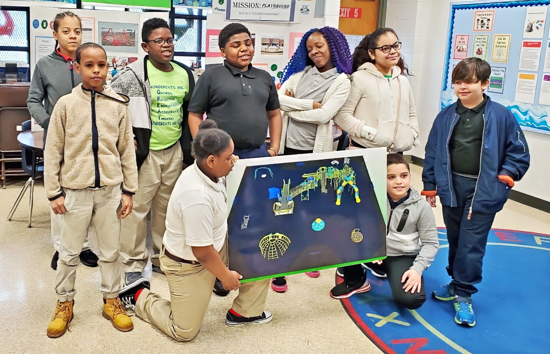 Student-led presentation of a "playground wishlist" at Whitney Young Elementary